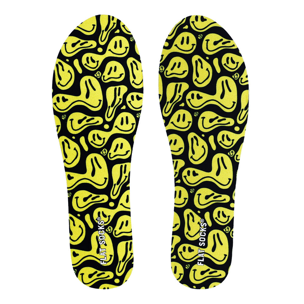 View of top fabric on pair of black with yellow faces print FLAT SOCK, insole liner features black with wavy yellow smiley faces print on top fabric #size_small-up-to-women-s-11-men-s-10