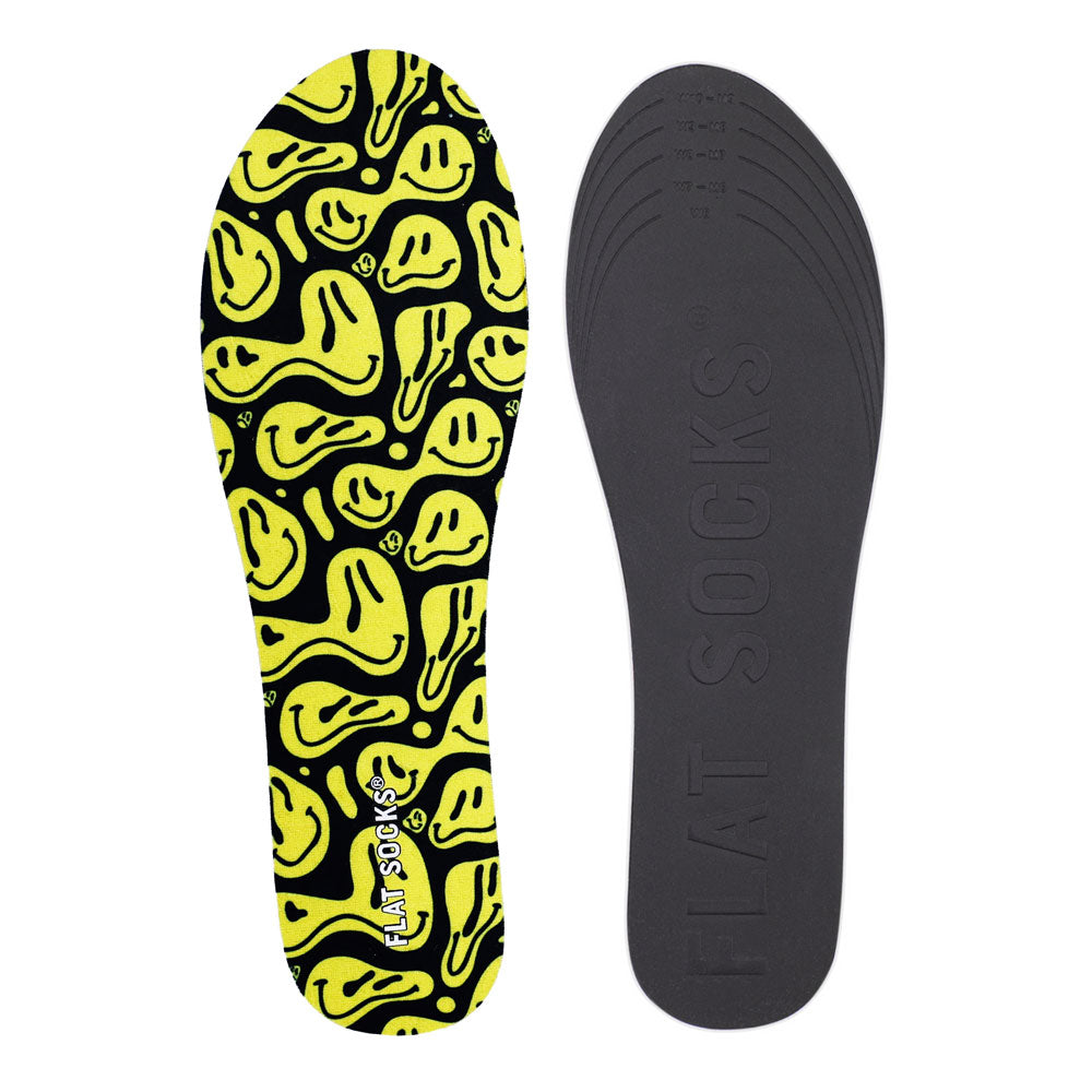 View of top fabric on left liner, view of bottom of right liner. Insole liner features black with yellow faces print on top fabric. Bottom of FLAT SOCK is 100% black polyurethane foam and provides slight cushion under foot and its super grippy surface helps liner stay in place all day #size_small-up-to-women-s-11-men-s-10