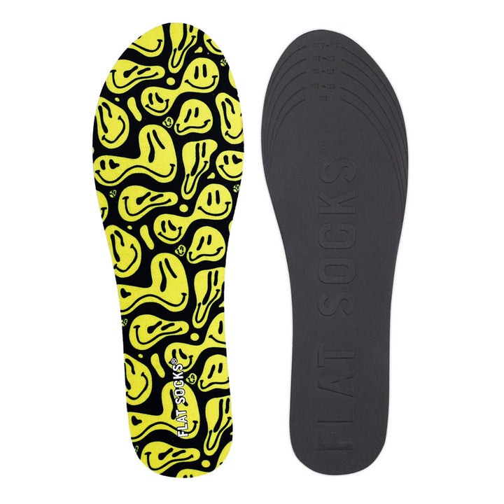 View of top fabric on left liner, view of bottom of right liner. Insole liner features black with yellow faces print on top fabric. Bottom of FLAT SOCK is 100% black polyurethane foam and provides slight cushion under foot and its super grippy surface helps liner stay in place all day #size_small-up-to-women-s-11-men-s-10