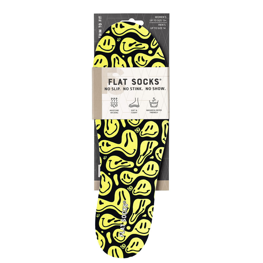 View of the front of black with yellow faces print FLAT SOCK in packaging, FLAT SOCKS no slip, no stink, no show. Moisture wicking, soft & cushy, washer & dryer friendly. Features black with wavy yellow smiley faces print on insole liner #size_large-up-to-women-s-13-men-s-14