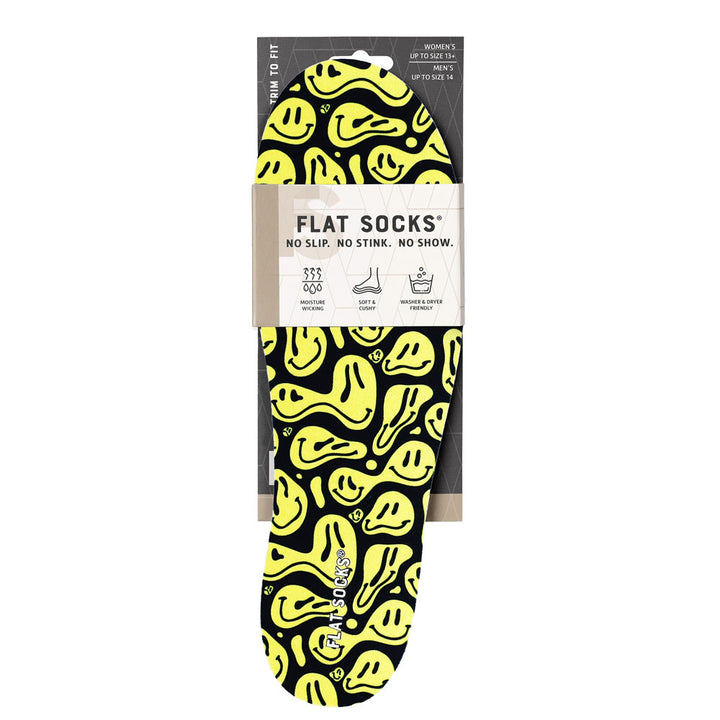 View of the front of black with yellow faces print FLAT SOCK in packaging, FLAT SOCKS no slip, no stink, no show. Moisture wicking, soft & cushy, washer & dryer friendly. Features black with wavy yellow smiley faces print on insole liner #size_large-up-to-women-s-13-men-s-14