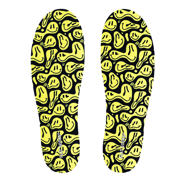 View of top fabric on pair of black with yellow faces print FLAT SOCK, insole liner features black with wavy yellow smiley faces print on top fabric #size_large-up-to-women-s-13-men-s-14