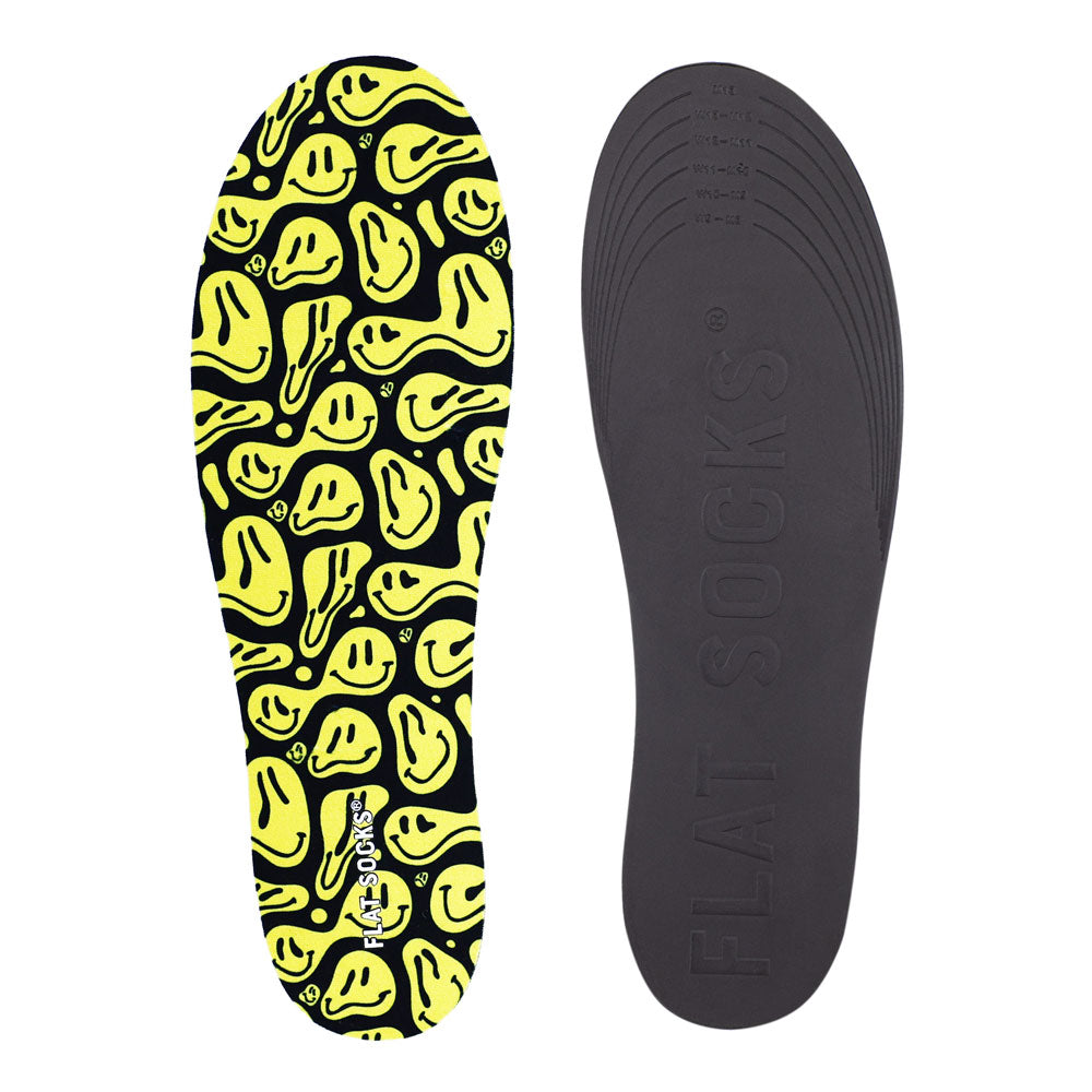 View of top fabric on left liner, view of bottom of right liner. Insole liner features black with yellow faces print on top fabric. Bottom of FLAT SOCK is 100% black polyurethane foam and provides slight cushion under foot and its super grippy surface helps liner stay in place all day #size_large-up-to-women-s-13-men-s-14