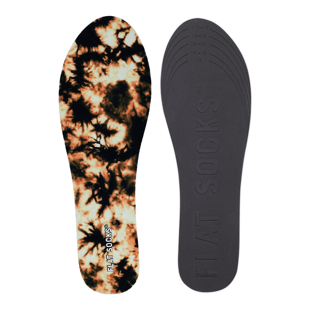 View of top fabric on left liner, view of bottom of right liner. Insole liner features bleached tie-dye on black printed on top fabric. Bottom of FLAT SOCK is 100% black polyurethane foam and provides slight cushion under foot and its super grippy surface helps liner stay in place all day