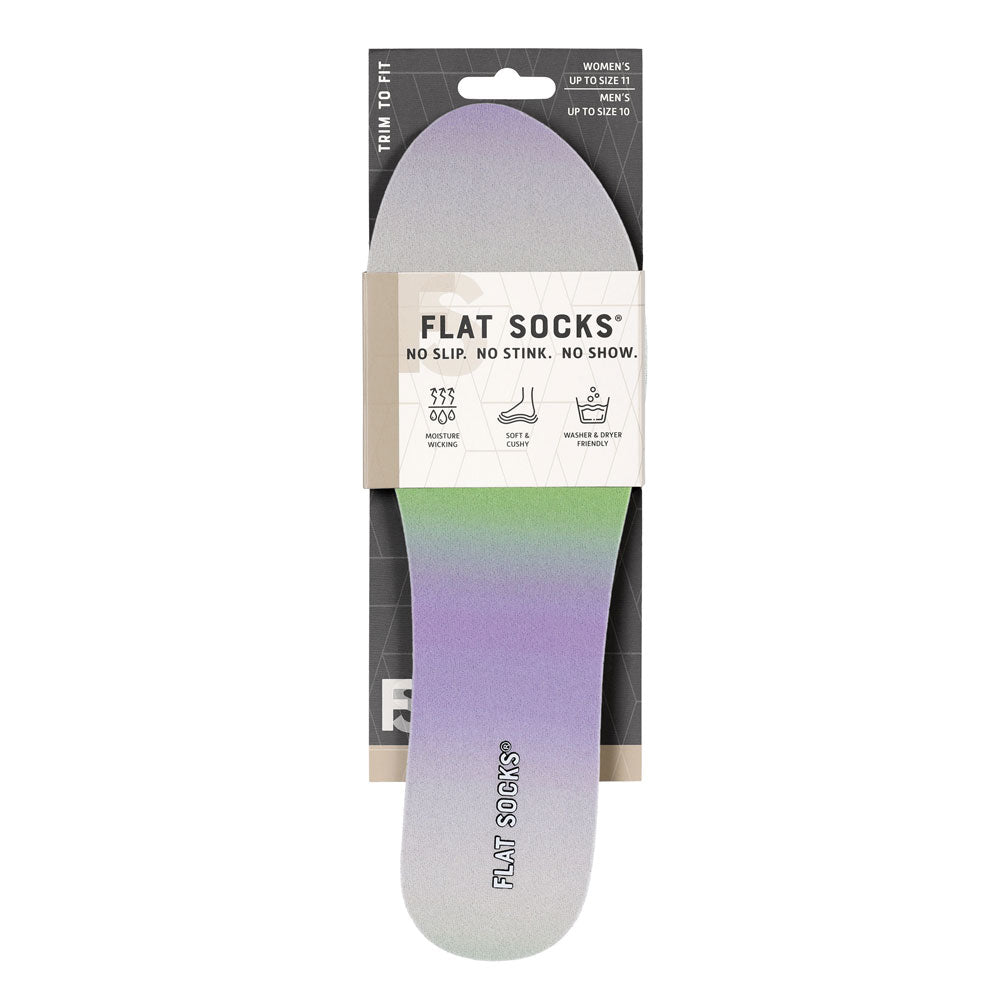 View of the front of Lilac Ombre print FLAT SOCK in packaging, FLAT SOCKS no slip, no stink, no show. Moisture wicking, soft & cushy, washer & dryer friendly. Features purple & green gradient printed on insole liner
