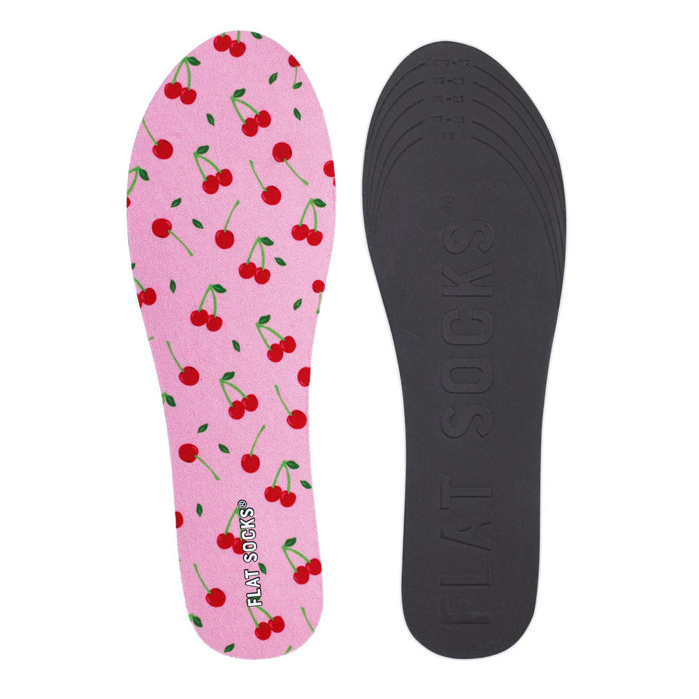 View of top fabric on left liner, view of bottom of right liner. Insole liner features light pink with fruit print on top fabric. Bottom of FLAT SOCK is 100% black polyurethane foam and provides slight cushion under foot and its super grippy surface helps liner stay in place all day #size_small-up-to-women-s-11-men-s-10