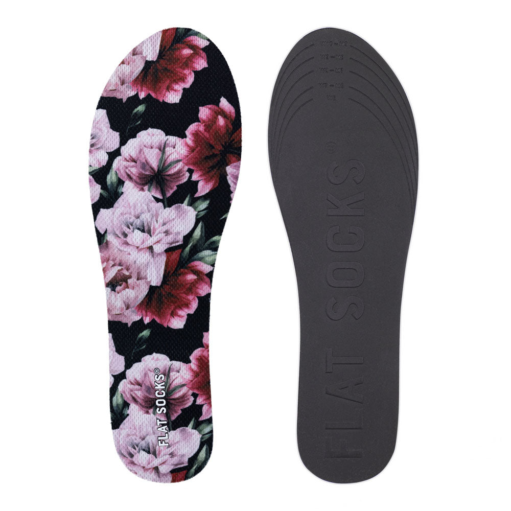 View of top fabric on left liner, view of bottom of right liner. Insole liner Features pink and dark fuchsia peony flowers and green peony leaves on top fabric. Bottom of FLAT SOCK is 100% black polyurethane foam and provides slight cushion under foot and its super grippy surface helps liner stay in place all day #size_small-up-to-women-s-11-men-s-10