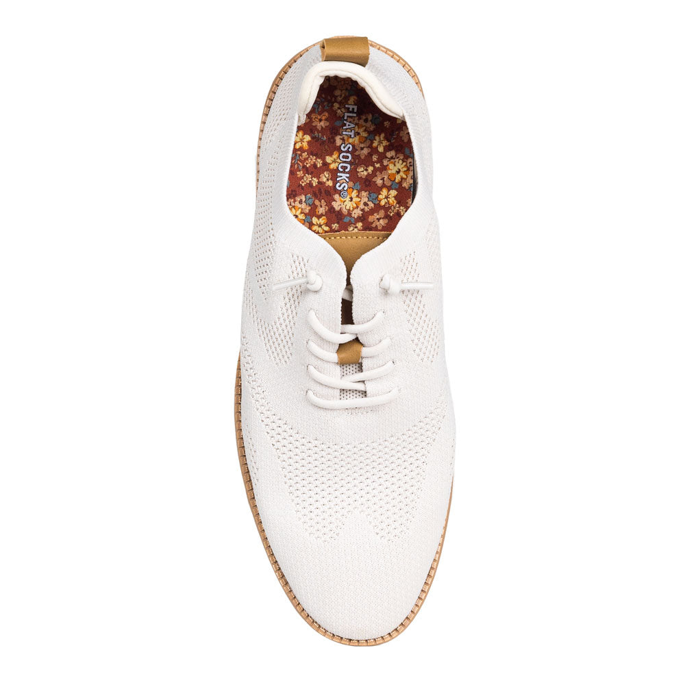 Rust red with floral print FLAT SOCK white casual sneaker. Insole liner Features orange, yellow, and tan flowers printed on top fabric. Shoe liner is made of 100% polyester BK mesh, a more breathable material, helps protect and extend life of shoes. #size_large-up-to-women-s-13-men-s-14