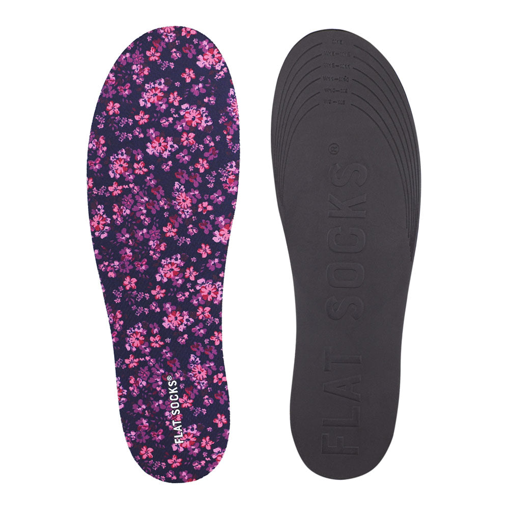 View of top fabric on left liner, view of bottom of right liner. Insole liner features dark purple with flowers print on top fabric. Bottom of FLAT SOCK is 100% black polyurethane foam and provides slight cushion under foot and its super grippy surface helps liner stay in place all day #size_large-up-to-women-s-13-men-s-14