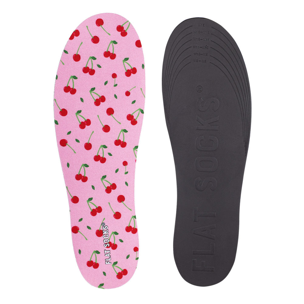 View of top fabric on left liner, view of bottom of right liner. Insole liner features light pink with fruit print on top fabric. Bottom of FLAT SOCK is 100% black polyurethane foam and provides slight cushion under foot and its super grippy surface helps liner stay in place all day #size_large-up-to-women-s-13-men-s-14