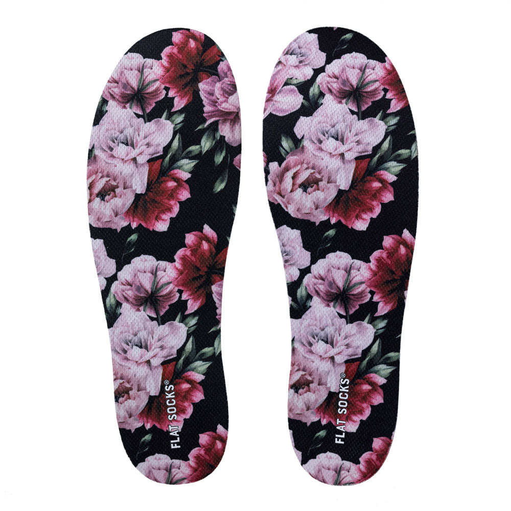 View of top fabric on pair of black with pink and dark fuchsia peony and green peony leaves floral print FLAT SOCKS, insole liner Features pink and dark fuchsia peony flowers and green peony leaves on top fabric #size_large-up-to-women-s-13-men-s-14