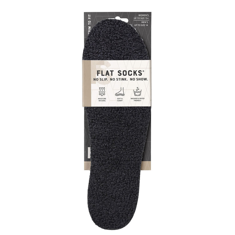 View of the front of black sherpa-like faux fur FLAT SOCK in packaging, FLAT SOCKS no slip, no stink, no show. Moisture wicking, soft & cushy, washer & dryer friendly. Features fuchsia, teal, purple, and light-blue Memphis style shapes printed on insole liner #size_large-up-to-women-s-13-men-s-14