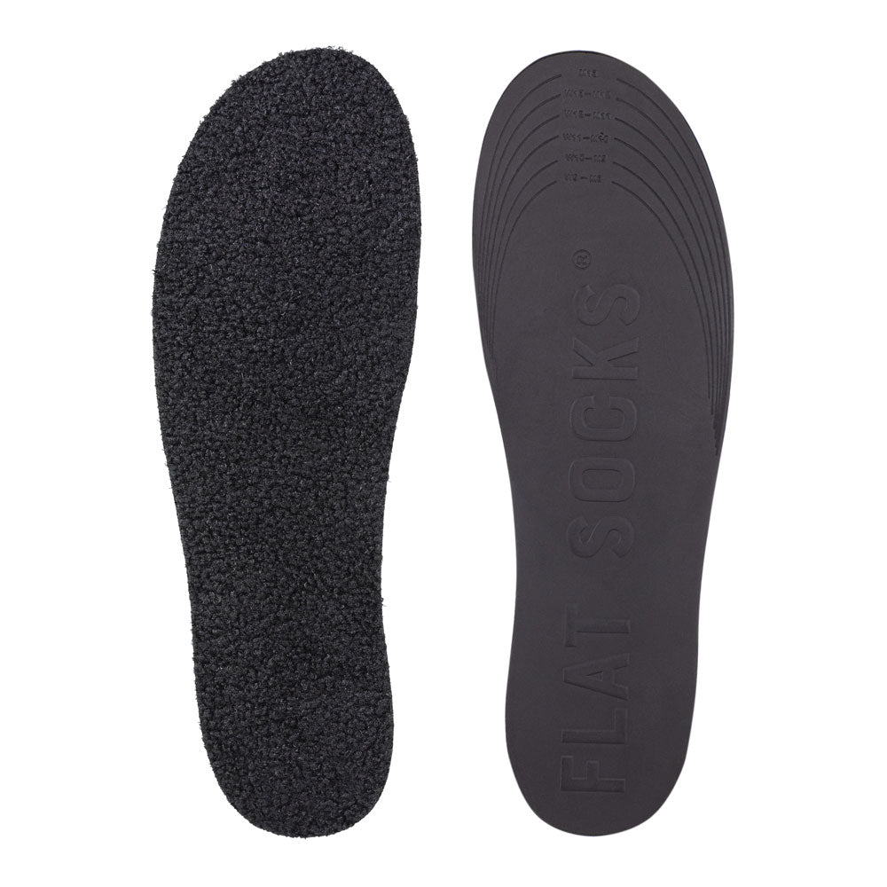 View of top fabric on left liner, view of bottom of right liner. Insole liner features black curly poodle-like faux fur. Bottom of FLAT SOCK is 100% black polyurethane foam and provides slight cushion under foot and its super grippy surface helps liner stay in place all day #size_large-up-to-women-s-13-men-s-14